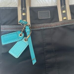 Coach dark brown  Nylon Tote with Turquoise Leather Tags and Tan Handles